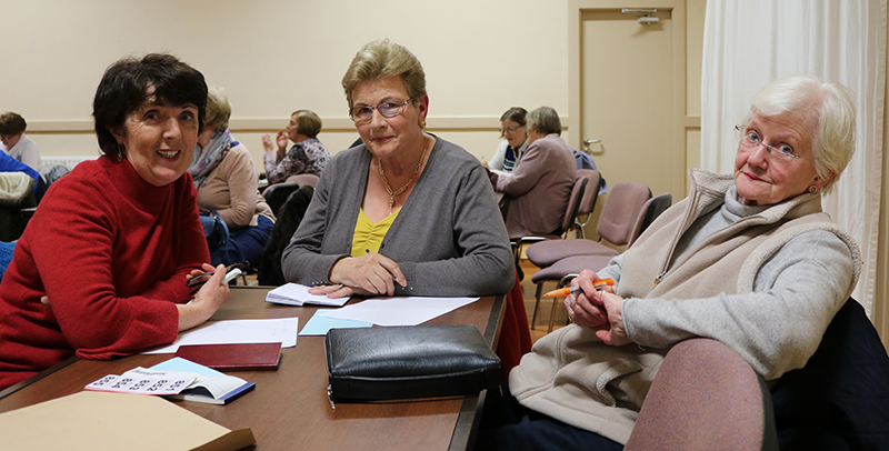 Betty Teahan, Christinal Murley and Mary Finlay sitting at the Quiz table