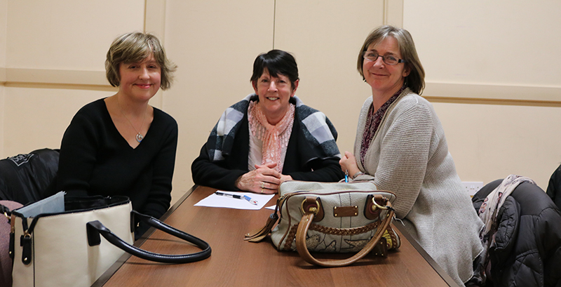 Margaret Jones, Susanna Braswell, and Catherine Wynne sitting at the Quiz table